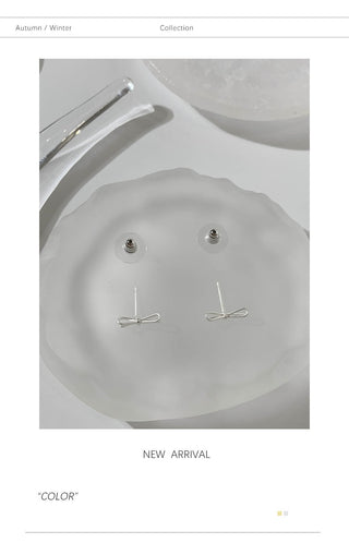 bow stud earrings