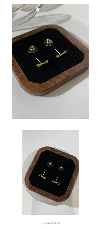 bow stud earrings