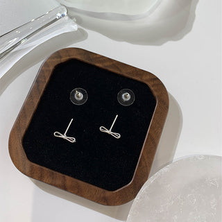 bow stud earrings