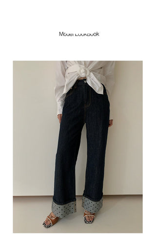 curling design jeans