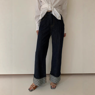 curling design jeans