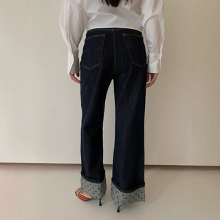 curling design jeans