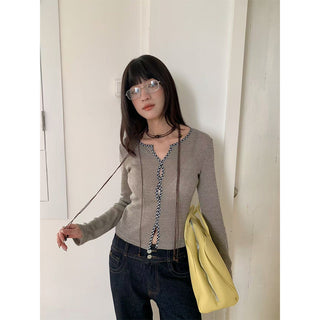 plaid twist sweater
