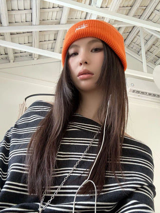 asymmetric striped sweater