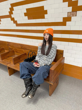 asymmetric striped sweater