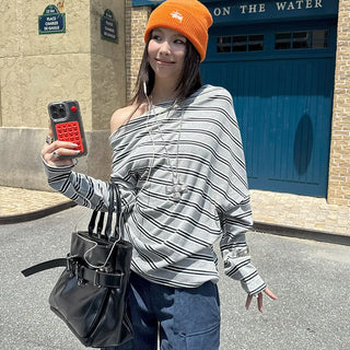 asymmetric striped sweater