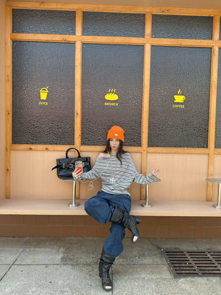 asymmetric striped sweater