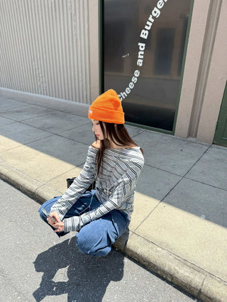 asymmetric striped sweater