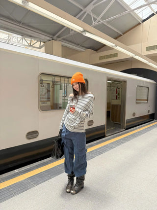 asymmetric striped sweater