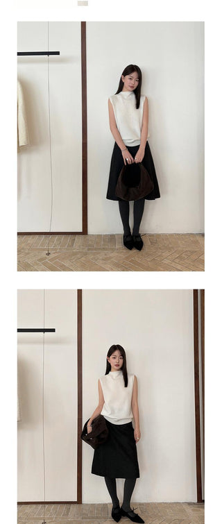 sleeveless turtleneck vest