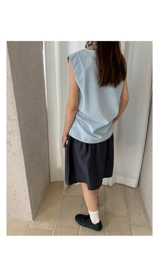 sleeveless peplum top