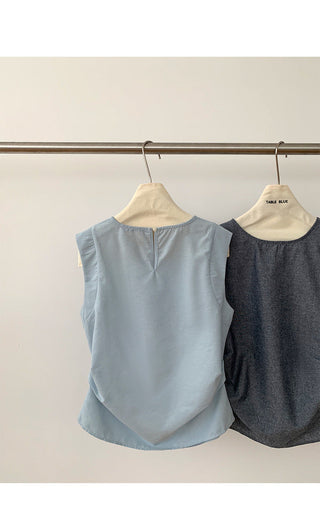 sleeveless peplum top