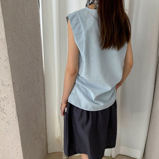 sleeveless peplum top