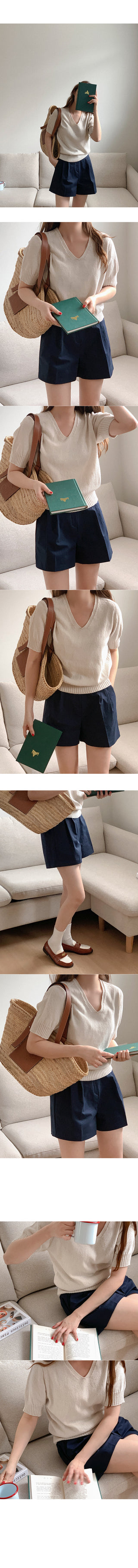 Minimal whole garment V-neck knit