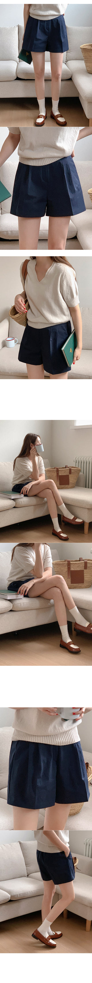 Minimal whole garment V-neck knit