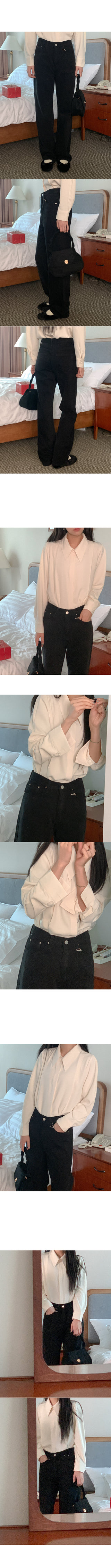 Asymmetrical high-neck vest