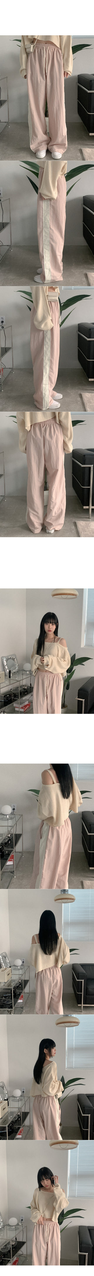 Asymmetrical boat neck cropped knit