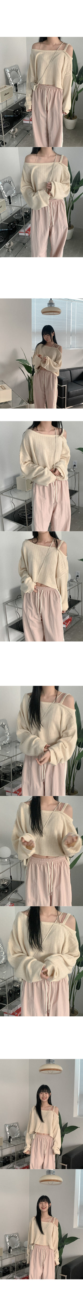 Asymmetrical boat neck cropped knit