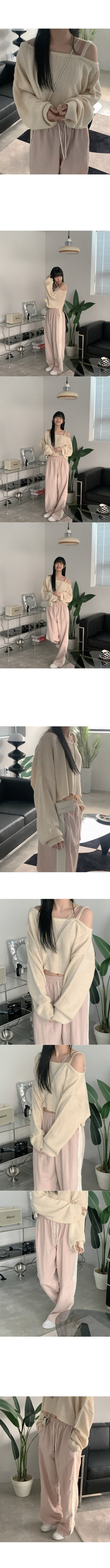 Asymmetrical boat neck cropped knit