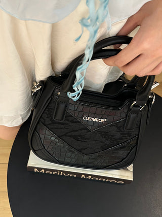 snake pattern satchel