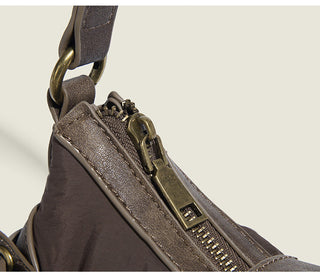 brown crescent bag