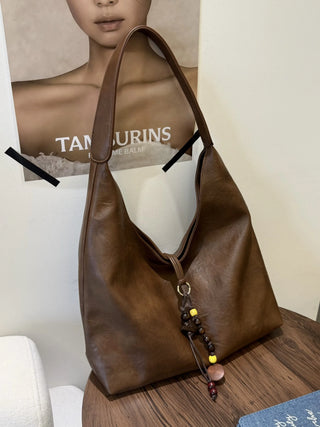 textured shoulder bag