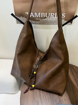 textured shoulder bag