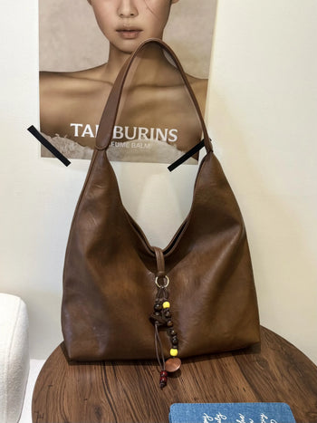 textured shoulder bag