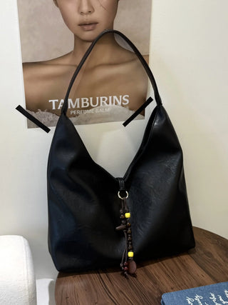 textured shoulder bag