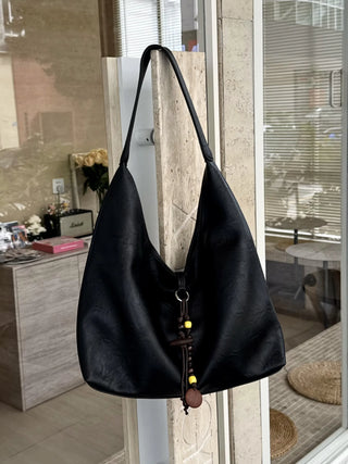 textured shoulder bag