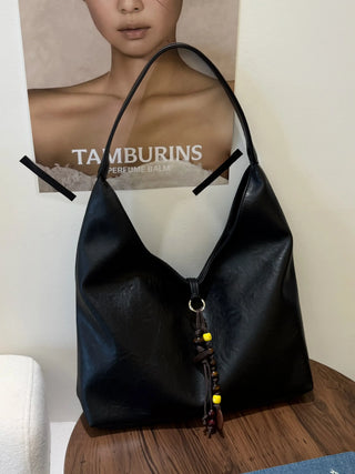 textured shoulder bag