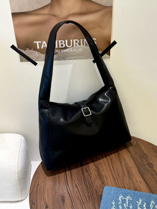 black leather handbag