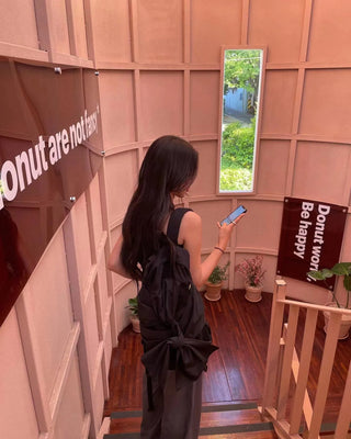 bow knotted backpack