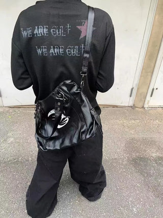 rivet crossbody backpack