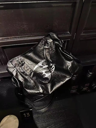 rivet crossbody backpack