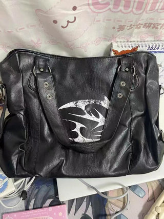 rivet crossbody backpack