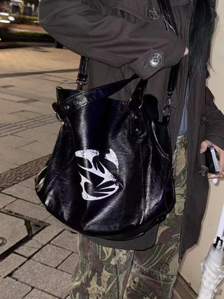 rivet crossbody backpack