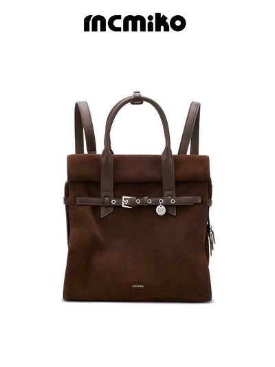 suede book backpack