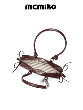 cowhide shoulder bag