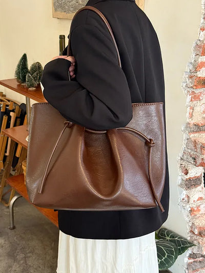 pleated bucket bag