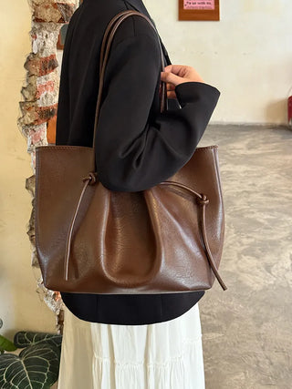 pleated bucket bag