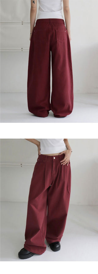Dipping to pin tuck maxi wide pants