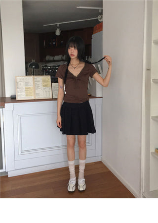 Lenka wrap button mini skirt