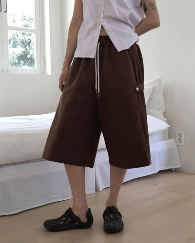 Kurtz side snap 8-quarter Bermuda jumpsuit pants