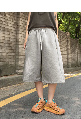 Kurtz side snap 8-quarter Bermuda jumpsuit pants