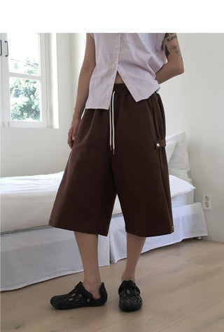 Kurtz side snap 8-quarter Bermuda jumpsuit pants