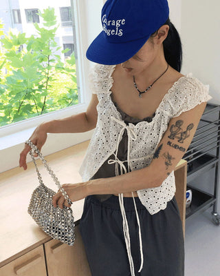 Lejan Punching Ribbon Strap Sleeveless Cardigan