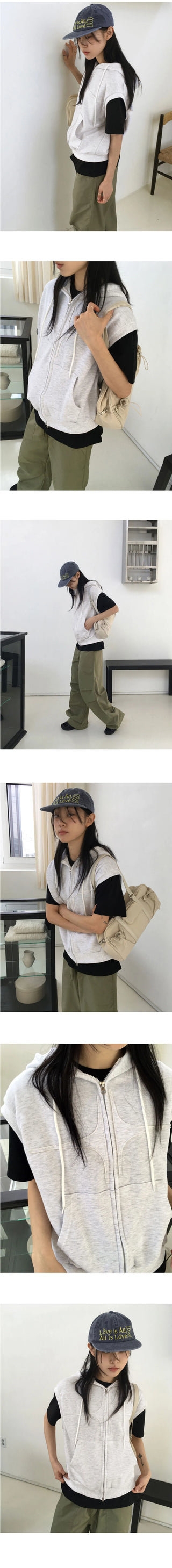 The New Byul two-way hooded vest zip-up