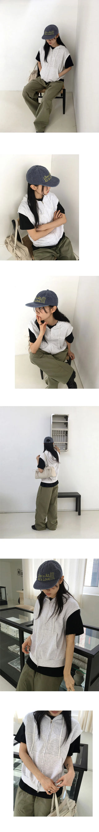 The New Byul two-way hooded vest zip-up