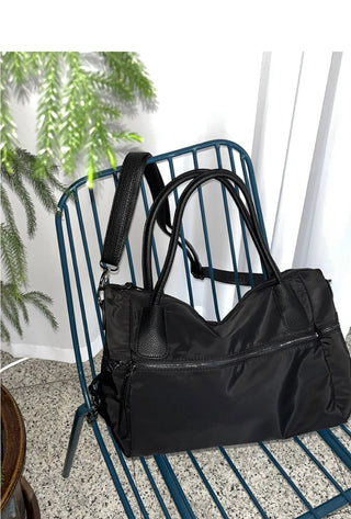 Nuts big zip pocket black shoulder bag